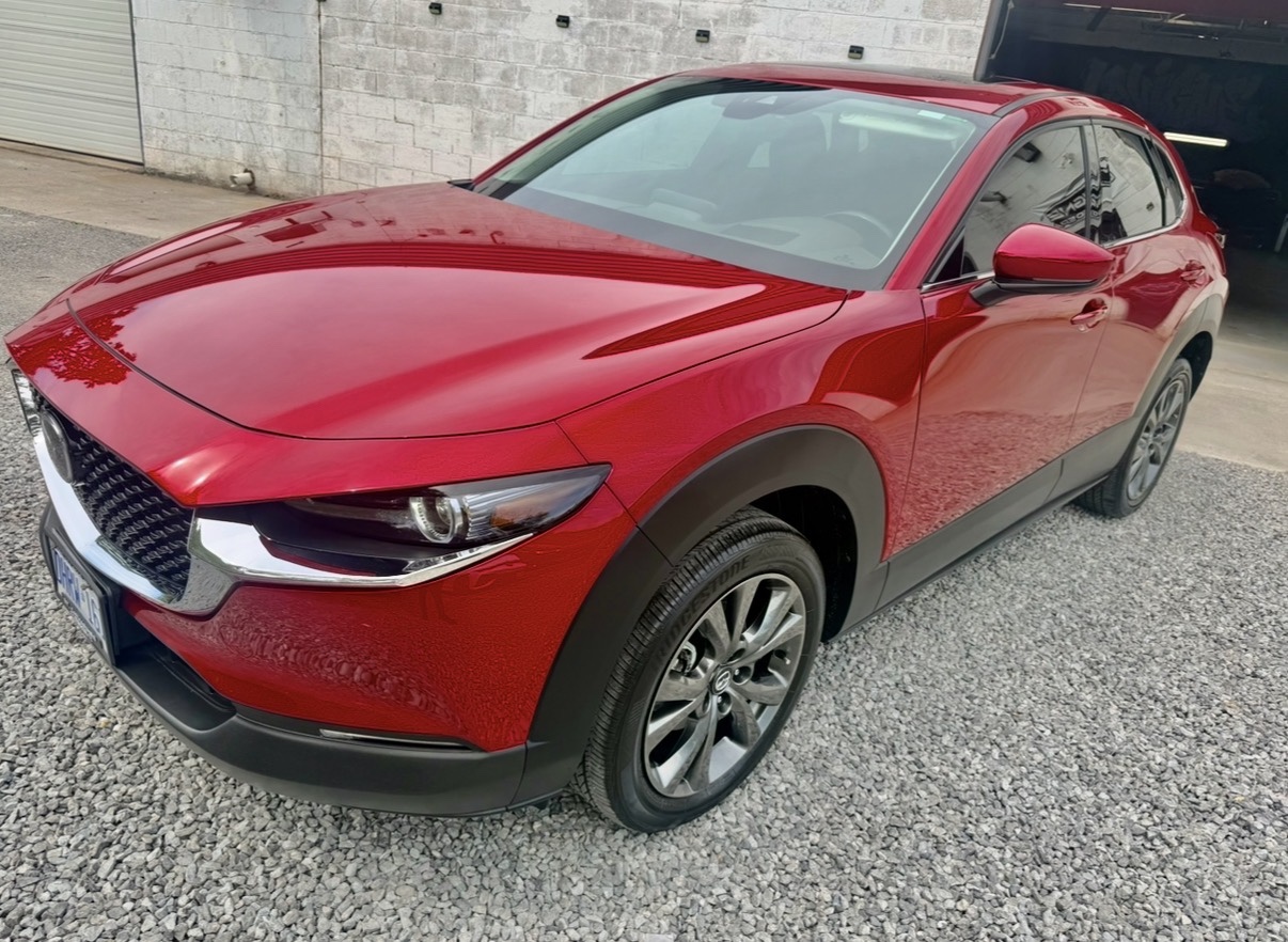Red Mazda ceramic coating result at Lavigne Autospa